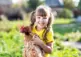 girl holding hen