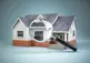 house with magnifying glass