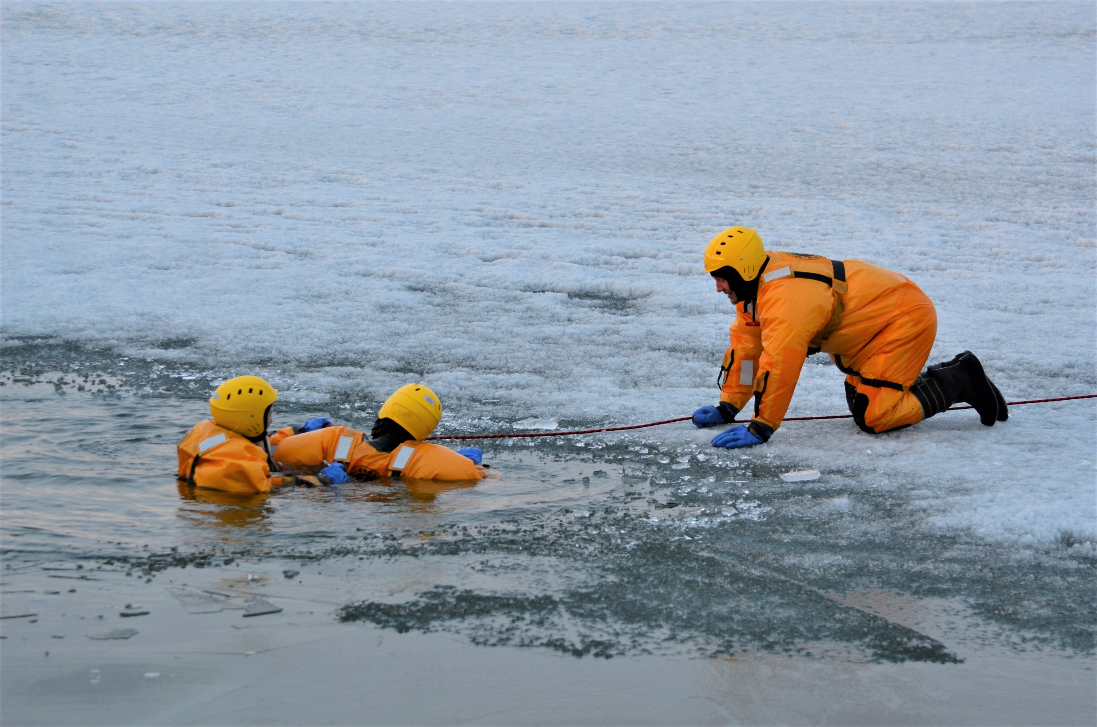 firefighters doing ice rescue